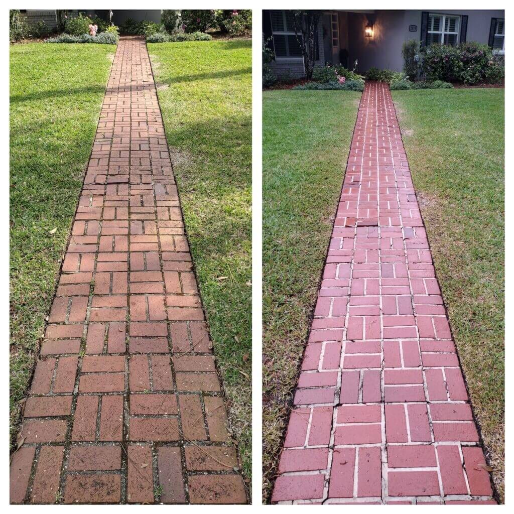 Side-by-side before-and-after image of a long, red brick walkway across a green lawn, showing the left side dull and dirty and the right side clean with bright red bricks and white grout.